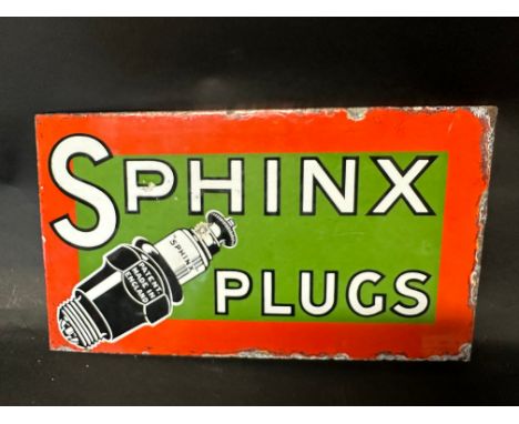 A Sphinx Plugs pictorial enamel advertising sign with hanging flange, 16 x 9".