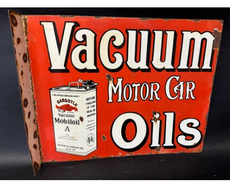 A Vacuum Motor Car Oils pictorial double sided enamel advertising sign with hanging flange with image of a Gargoyle Mobiloil 