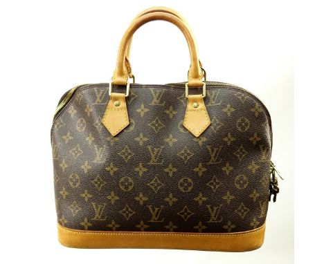 Louis Vuitton Brown Canvas Monogram Alma PM. Golden brass hardware, brown interior with slot and patch pockets, vachetta hand