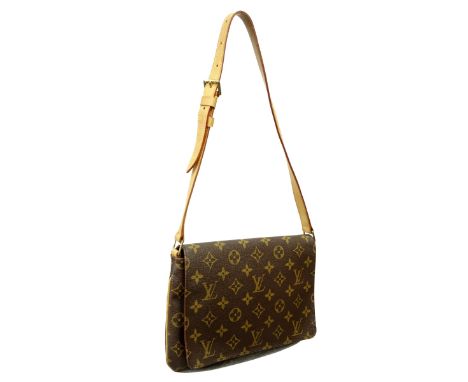 Louis Vuitton Brown Canvas Monogram Musette Tango Bag. Golden brass hardware, brown interior with patch pocket. Dustbag inclu