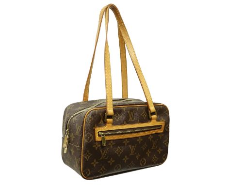 Louis Vuitton Brown Canvas Monogram Cite MM Bag. Golden brass hardware, brown interior with patch pockets, vachetta handles. 