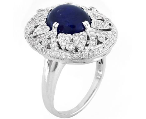 Approx. 6.27 Carat Cabochon Sapphire, 1.50 Carat Round Brilliant Cut Diamond and 18 Karat White Gold Ring. Sapphire with vivi