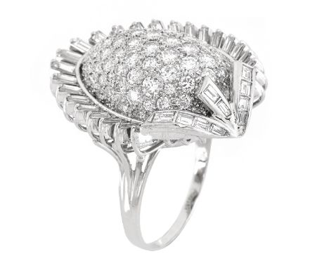 Vintage Approx. 4.0 Carat Round Brilliant and Baguette Cut Diamond and 14 Karat White Gold Ring. Diamonds G-H color, VS1 clar