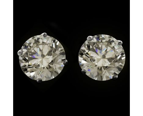 15.37 Carat TW Round Brilliant Cut Diamond and 14 Karat White Gold Ear Studs. Diamonds K color, SI2 clarity. Stamped 14K. Mea