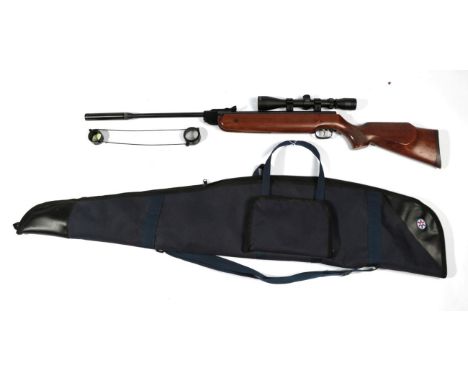 PURCHASER MUST BE 18 YEARS OF AGE OR OVER A Weihrauch HW 80 K .22 Calibre Air Rifle, numbered 1622874, the beech stock with c