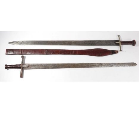 A 19th Century Sudanese Kaskara, the 87cm double edge steel blade with three narrow half fullers and stamped with two crescen