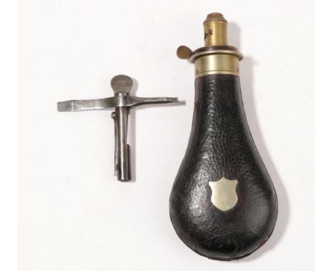 A Late 19th Century Enfield Combination Tool, in steel, of T shape, with inspector's stamps; a Leather Covered Steel Powder F
