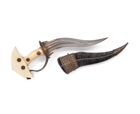 An 18th/19th Century Indian Khanjali, the 21cm double edge curved and fullered steel blade with raised reinforced rib and swo