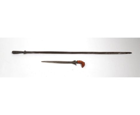 A Javanese Kris, with 28cm straight double edge pamor steel blade and wood garuda bird hilt, lacks scabbard, 35cm; a 19th Cen