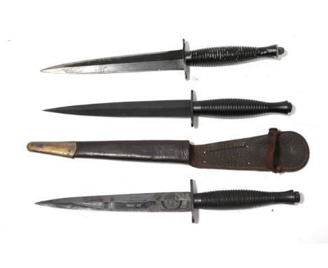 A Commemorative Army Commando Knife, third pattern, the machine forged blued steel blade etched The Army Commando 1940-45, an