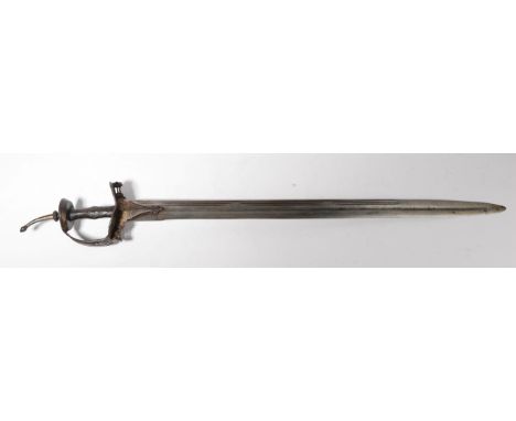 An 18th Century Indian Khanda, the 75.5cm single edge triple fulllered steel blade double edged for the last 23cm and with tr