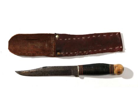 A Second World War RAF Servicing Commando Knife, 15cm clip point steel blade stamped with broad arrow, W &amp;.S.B, Sheffield