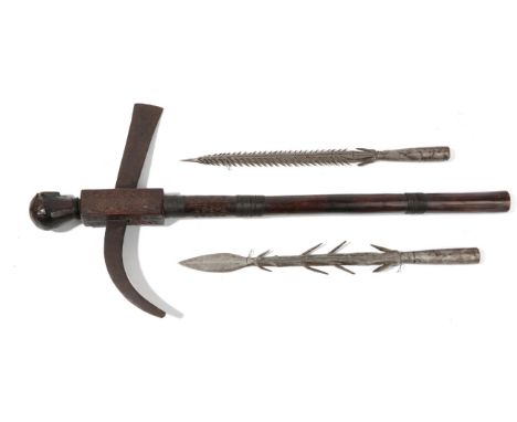 An Early 20th Century Shona Tooling Axe, the rectangular blade with hooked tang inserted through the square section wood haft