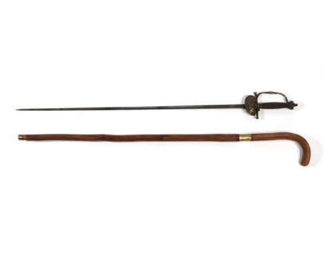 A Victorian Court Sword, the 81.5cm double edge steel blade bearing traces of bluing and etched with Royal cypher, crossed st