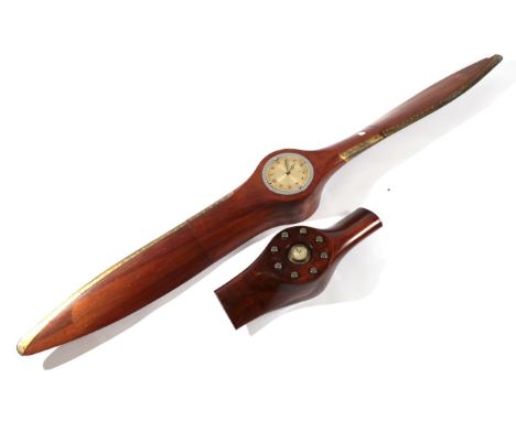 An Avro Anson Twin-bladed Wooden Propeller, for an Armstrong Siddeley Cheetah aero-engine (cut and later repaired), the cowl 