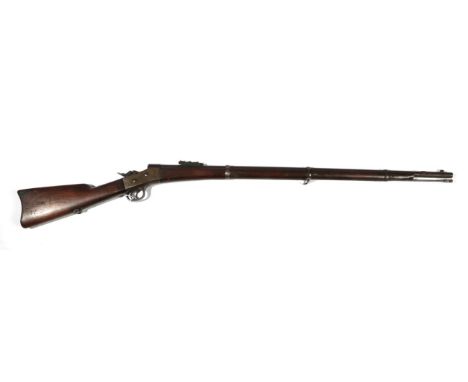 A Remington Rolling Block Rifle, the 89cm round barrel with hinged ladder rear sight, the tang behing the hammer faintly stam