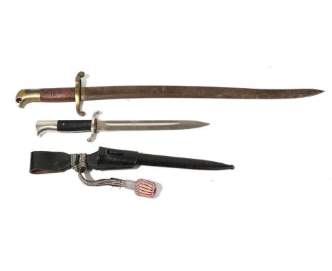 A German Third Reich Police Parade Dagger, with unmarked single edge plated blade, plated recurving crossguard and bird head 