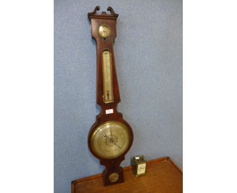 A small brass carriage clock and a 19th Century inlaid mahogany barometer, a/f 