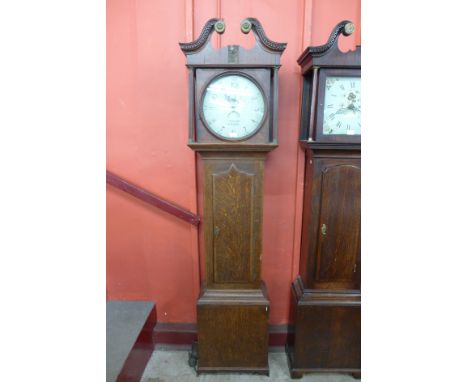 A 19th Century oak 30 hour longcase clock, the painted circular dial signed J. Wainwright, Nottingham 