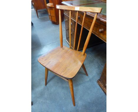 An Ercol Blonde elm and beech 391 model chair 