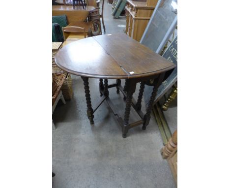 An oak bobbin turned gateleg table 