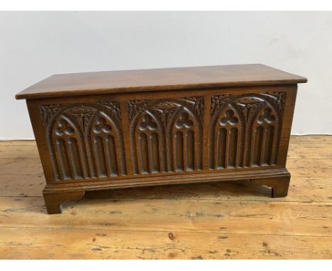 VICTORIAN STYLE OAK COFFER on bracket feet with gothic arch carving on front panel(92cm wide, 46cm high, 37cm) 