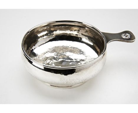 GEORGE VI SILVER PORRINGERALBERT EDWARD JONES, BIRMINGHAM 1937of compressed baluster form with hammered decoration&nbsp;11cm 