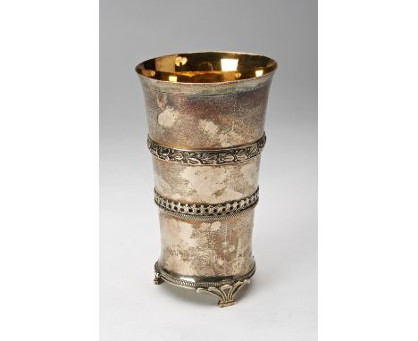 VICTORIAN SILVER GILT BEAKERFREDERICK ELKINGTON, LONDON 1874of flared cylindrical form applied with chased relief bands, rais