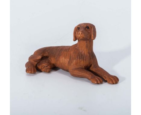 Hand-carved hardwood netsuke of a dog