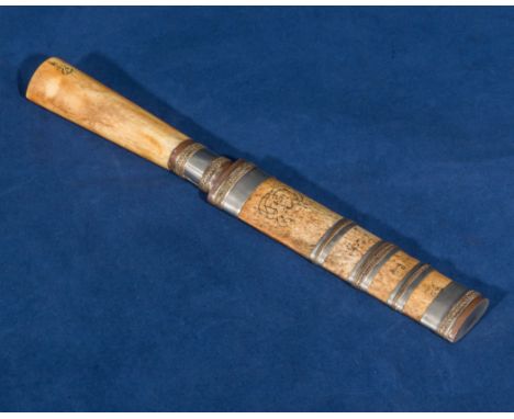 An Islamic knife and wooden scabbard 