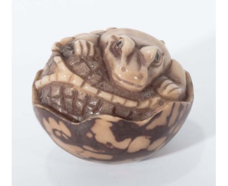 Tagua nut style netsuke of crocodile hatching from egg
