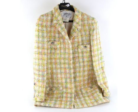 Chanel boucle wool tweed  blazer jacket in pastel shades, silver coloured buttons,  and  cream satin lining and interior chai