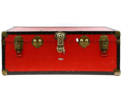 A large collection of dress making tweed and felt in a vintage trunk .       Large Collection of fabrics approx 32 pieces of 