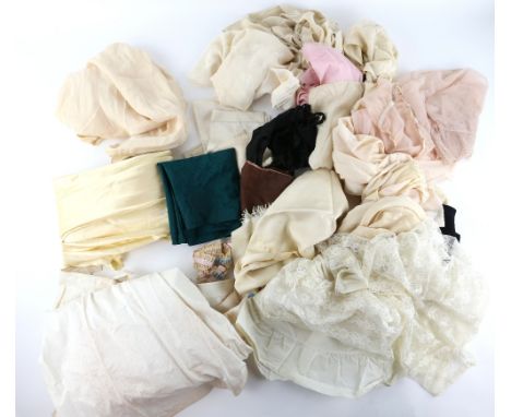 A 1940s cream silk blouse with applied butterflies, 4 silk underslips, 3 underskirts, satin night gown, white cotton underski