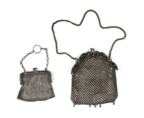 A silver mesh purse and another in plate with paste stones and enamel stones.       