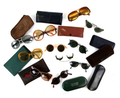 Collection of  11 pairs of vintage sunglasses 1930s and 1980s some in cases  .       The sunglasses are dusty and have been w