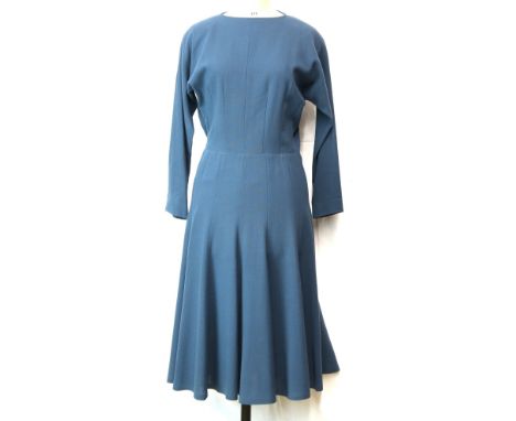 Jean Muir London 1970s Peacock Green wool crepe mid calf long sleeved day dress with A lined skirt.       Good overall condit