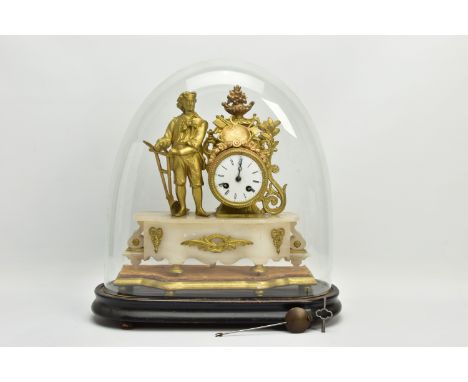 A LATE 19TH CENTURY GILT METAL AND ALABASTER FIGURAL MANTEL CLOCK, the drum shaped clock surmounted by urn of fruit and flowe