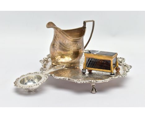 A GEORGE III SILVER CREAM JUG AND A VICTORIAN WAITER, a baluster form creamer jug detailed with a bright cut pattern and foli