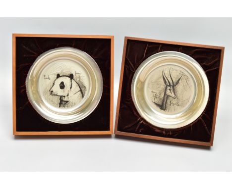 TWO ELIZABETH II STERLING SILVER BERNARD BUFFET PLATES MOUNTED IN EASEL BACK FRAMES, etched with a design of a 'Gazelle' and 