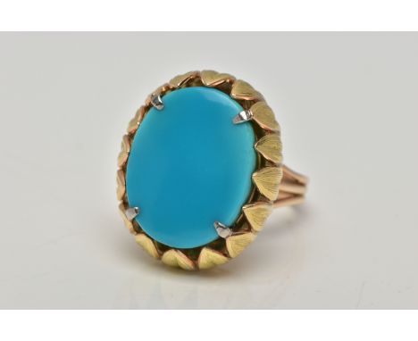 A MID 20TH CENTURY TURQUOISE YELLOW METAL COCKTAIL RING, set with a principal oval flat polished top and domed base turquoise
