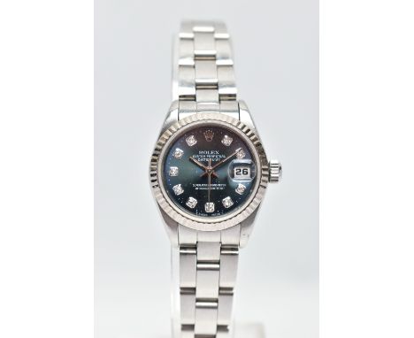 AN 'ROLEX' OYSTER PERPETUAL DATEJUST 26 WRISTWATCH, model number 69174, serial number E638376, automatic movement 2135 calibr