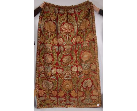 A pair of late 17th century Italian decorative embroidered curtains, each made up of three panels, the motifs probably re-app