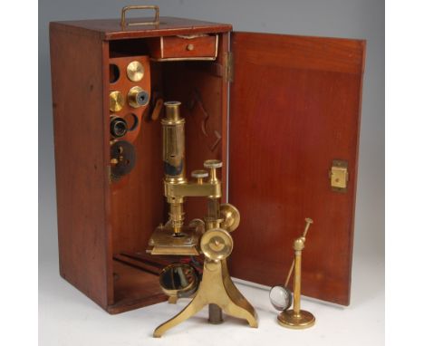 An early 20th century lacquered brass monocular microscope, possibly by Ross of London, the single tube with quartz and fine 
