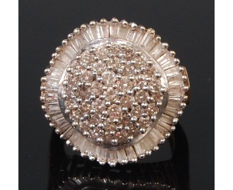 A ladies modern 14ct gold diamond cluster ring, of good size, the centre section as tiered small brilliants within a surround