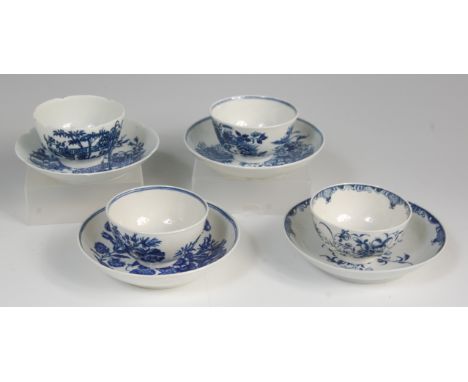A collection of four various first period Worcester blue and white tea bowls on stands, to include two examples printed in th