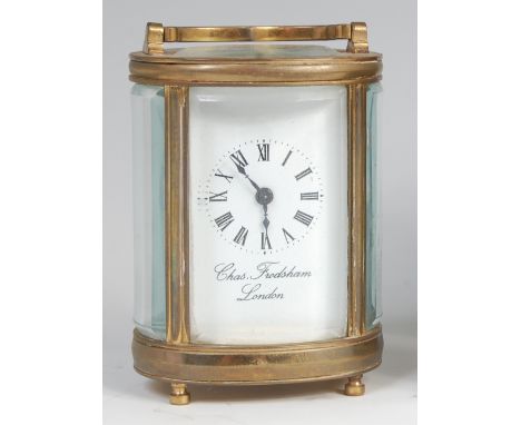 A Charles Frodsham of London lacquered brass minuet carriage clock, of barrel shape, having signed white enamel dial, visible