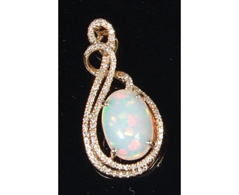 A 14ct yellow gold and Ethiopian cabochon opal set pendant, on finelink neck chain, the four claw set opal weighing approx 2c