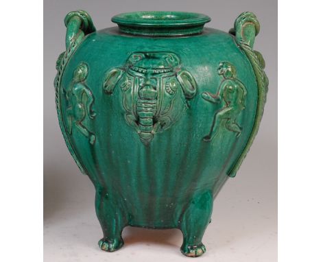 A Chinese green glazed earthenware vase, of baluster form, decorated with nude figures and elephant mask, 19th/20th century, 