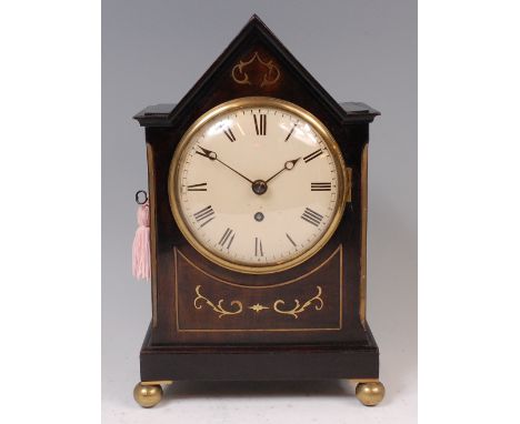An early 19th century stained walnut? and brass inlaid bracket clock, having an unsigned convex white enamel dial, with singl